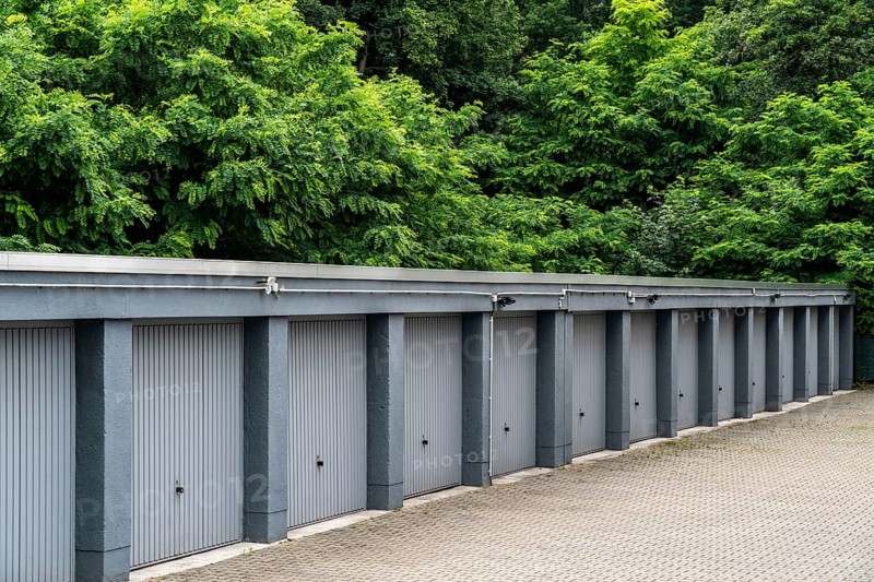 Garage courtyard in a housing estate in Duisburg-Neuenkamp, older residential complex, North Rhine-Westphalia, Germany, Europe