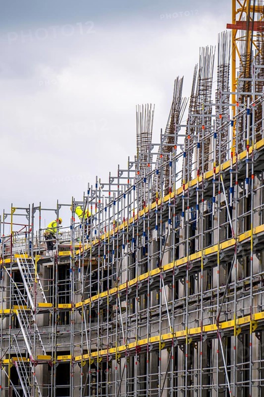 Construction site, new construction of a high-rise office building, facade of the shell, scaffolding, Cologne, North Rhine-Westphalia, Germany, Europe