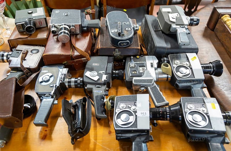 A collection of vintage cine film cameras on display at auction, UK