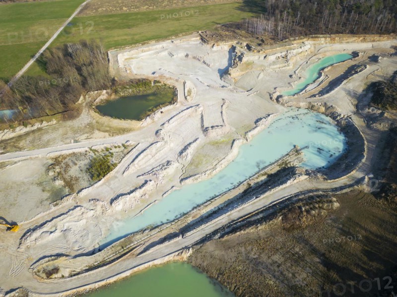The Blue Hole, a residual hole from the kaolin mining operations of Kaolin- und Tonwerke Seilitz-Löthain GmbH, is now a natural paradise, but can only be entered by anglers, Ockrilla, Saxony, Germany, Europe