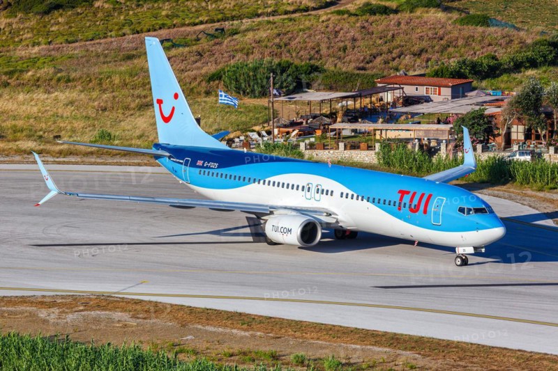 A TUI Airways Boeing 737-800 aircraft with the registration G-FDZS at Skiathos Airport, Greece, Europe