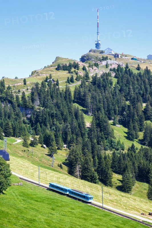 View of Mount Rigi with Rigi railway with Alps mountains in Rigi, Switzerland, Europe