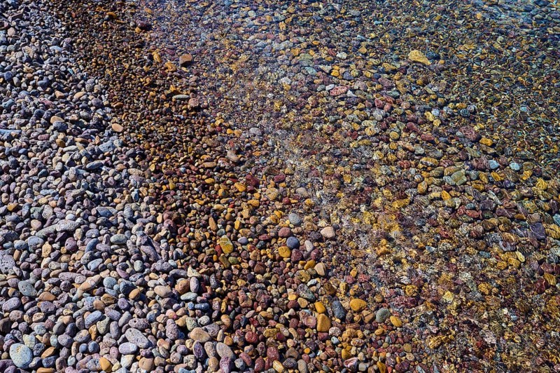 Colourful pebbles on the beach with water and different textures, Lambi beach, pebble beach, Patmos, Dodecanese, Greek Islands, Greece, Europe