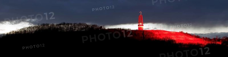 Artwork Illuminated at night with red illuminated slagheap Rheinpreussen by Otto Piene, Moers, Ruhr Area, North Rhine-Westphalia, Germany, Europe
