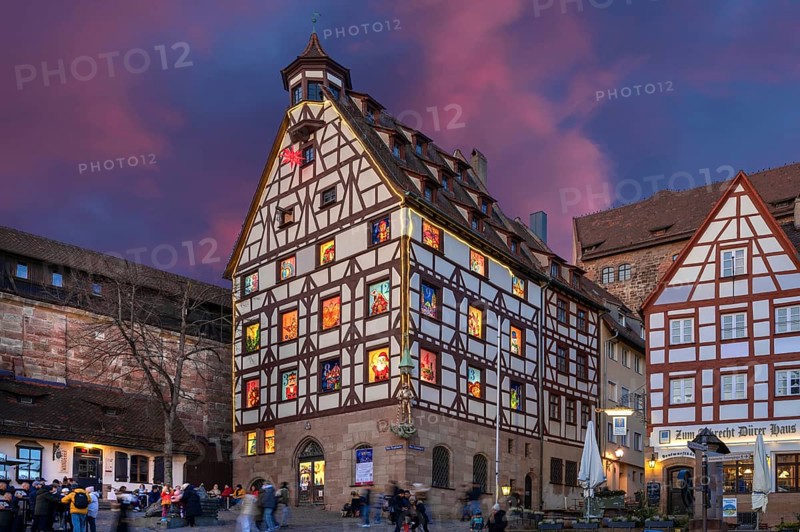 Historic Pilatus House with an Advent calendar in the evening, Tiegärtnertorplatz, Nuremberg, Middle Franconia, Bavaria, Germany, Europe