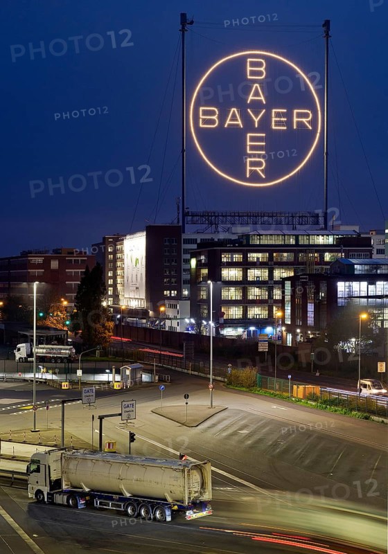 Bayer cross in the blue hour on the premises of Bayer AG, Leverkusen, Bergisches Land, North Rhine-Westphalia, Germany, Europe