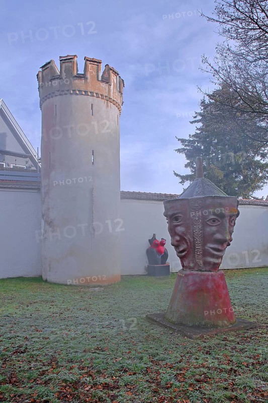 Sculptures by Helmut Braig and Bocksturm built in the 16th century with historic town wall, modern art, faces, masks, sculpture park, Giengen an der Brenz, Swabian Alb, Baden-Württemberg, Germany, Europe