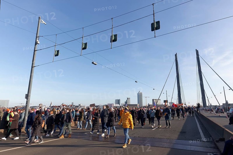 Demonstrators march across the Rheinknie Bridge, large demonstration against right-wing extremism and AfD on 27 January 2024 in Düsseldorf, North Rhine-Westphalia, Germany, Europe