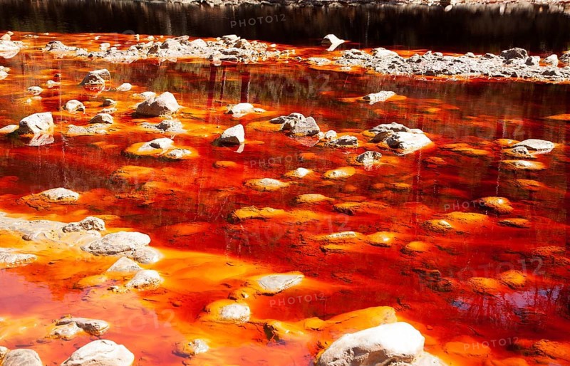 Blood red mineral laden water Rio Tinto river Minas de Riotinto mining area, Huelva province, Spain, Europe