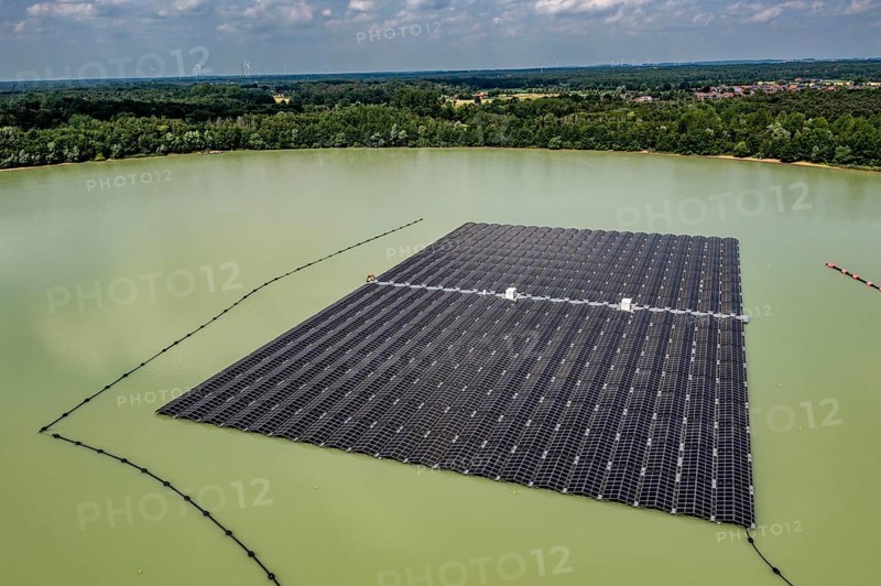 Germany's largest floating solar power plant on the Silbersee III, a quarry pond no longer used for sand mining, near Haltern am See, operated by Quarzwerke GmbH, around 5800 solar modules, on an area of a good 2 football pitches, generate 3.1 megawatts of power, the company uses the electricity itself on weekdays, at weekends it flows into the public grid, North Rhine-Westphalia, Germany, Europe