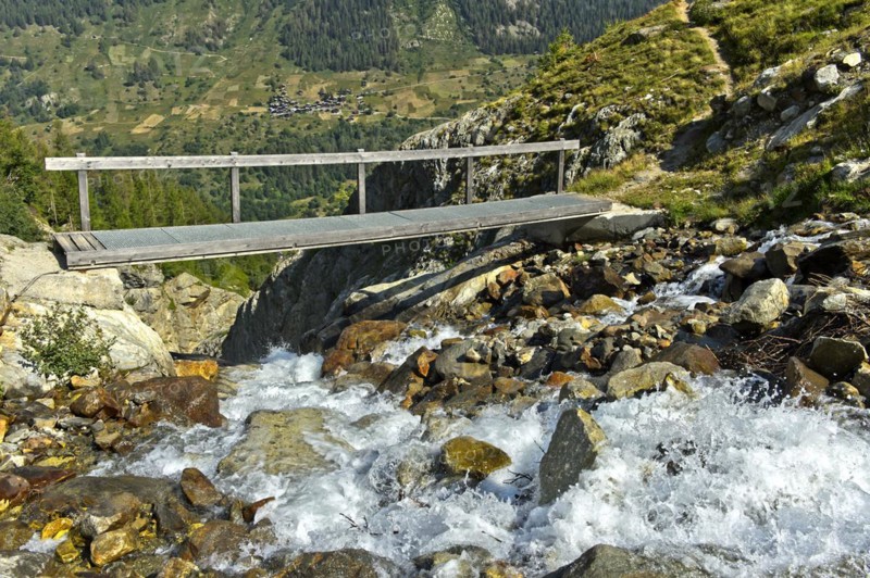 Narrow bridge over the Nästbach torrent on the way to the Bietschhorn hut, near Blatten, Lötschental, Valais, Switzerland, Europe