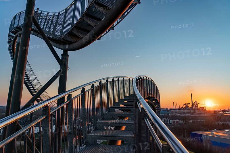 Landmark Angerpark Tiger & Turtle, Magic Mountain, walk-in sculpture in the form of a rollercoaster on the Heinrich-Hildebrand-Höhe spoil tip, HKM steelworks, sunset, Duisburg, North Rhine-Westphalia, Germany, Europe