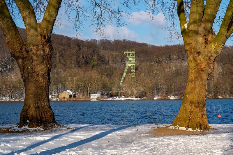 Winter, snowy landscape, Lake Baldeney, headframe of the former Carl Funke colliery in Essen-Heisingen, Essen, North Rhine-Westphalia, Germany, Europe