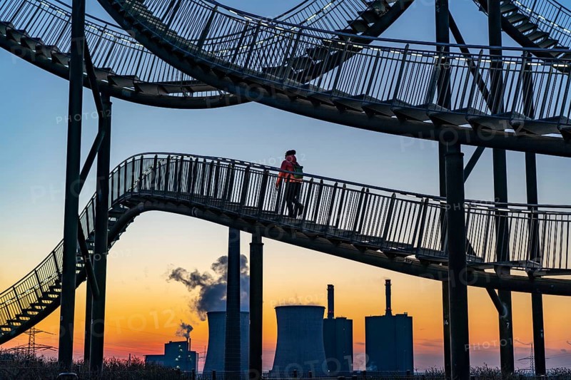 Landmark Angerpark Tiger & Turtle, Magic Mountain, walk-in sculpture in the form of a rollercoaster on the Heinrich-Hildebrand-Höhe spoil tip, HKM steelworks, sunset, Duisburg, North Rhine-Westphalia, Germany, Europe