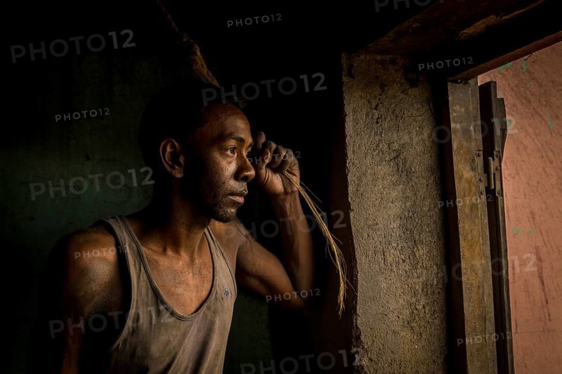 Workers in an aluminium recycling factory in the highlands of Madagascar