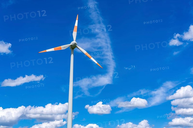 Wind turbine, wind energy plant from the manufacturer Enercon, blue sky with many white clouds, near Schermbeck, North Rhine-Westphalia, Germany, Europe