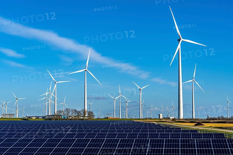 Vopak Solarpark Eemshaven, 19 hectares of solar modules with a capacity of 25 megawatts, around the Vopak tank terminal in the industrial harbour of Eemshaven, wind farm, Groningen, Netherlands