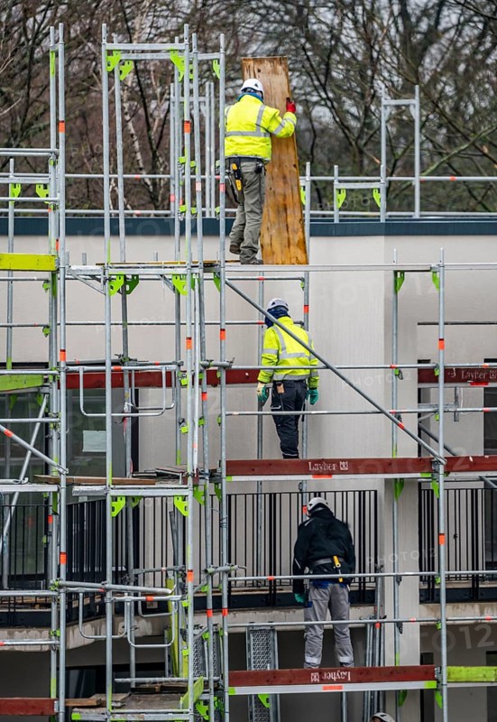 Construction site, scaffolding, dismantling of scaffolding on a residential building, Germany, Europe