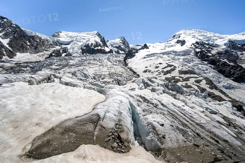 High alpine glaciated mountain landscape, La Jonction, Glacier des Bossons meets Glacier de Taconnaz, summit of Mont Maudit and Mont Blanc, Chamonix, Haute-Savoie, France, Europe