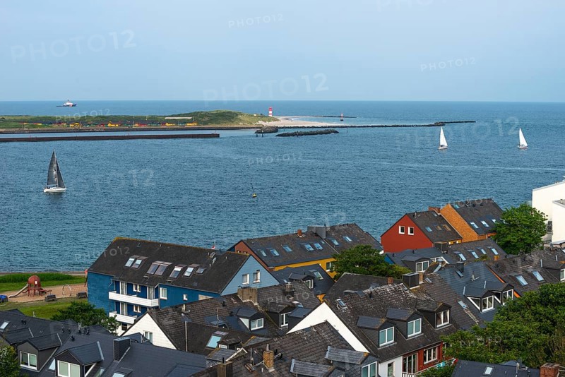 View from the upper land over houses in the lower land to the Helgoland dune, offshore island Helgoland, sailing boats, lighthouse, North Sea, district Pinneberg, Schleswig-Holstein, Germany, Europe