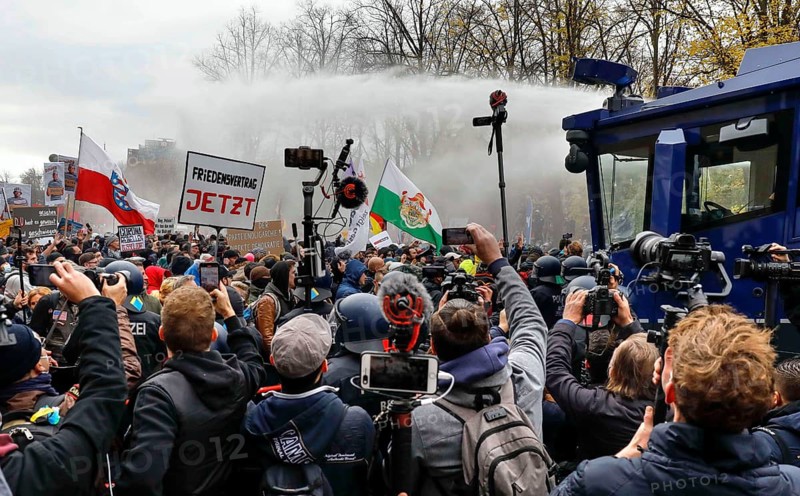 Water cannon in use at the Brandenburg Gate. Once again, thousands of corona deniers are demonstrating against the restrictions in the pandemic. The police broke up the demonstration for not observing social distancing rules and not wearing face masks, Berlin, 18 November 2020