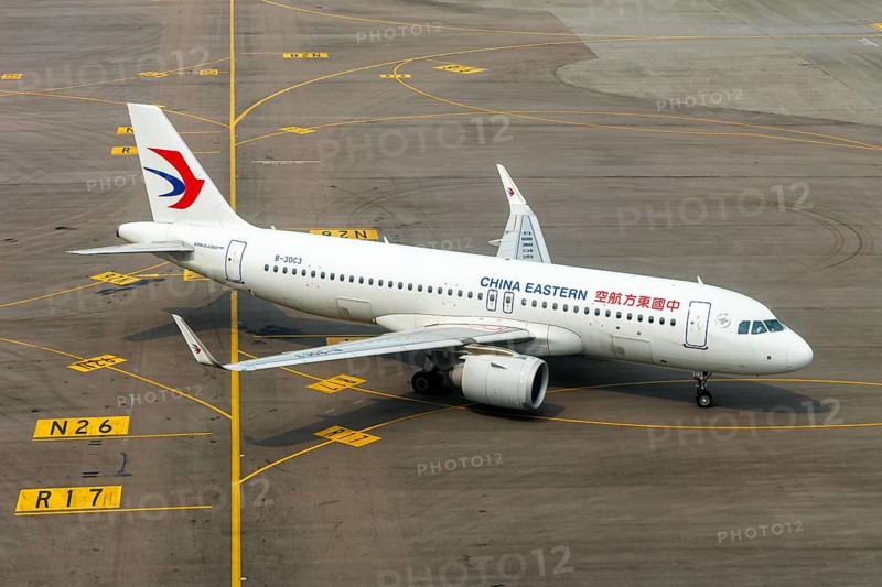 A China Eastern Airlines Airbus A320neo aircraft with the registration number B-30C3 at Chek Lap Kok Airport (HKG) in Hong Kong, China, Asia