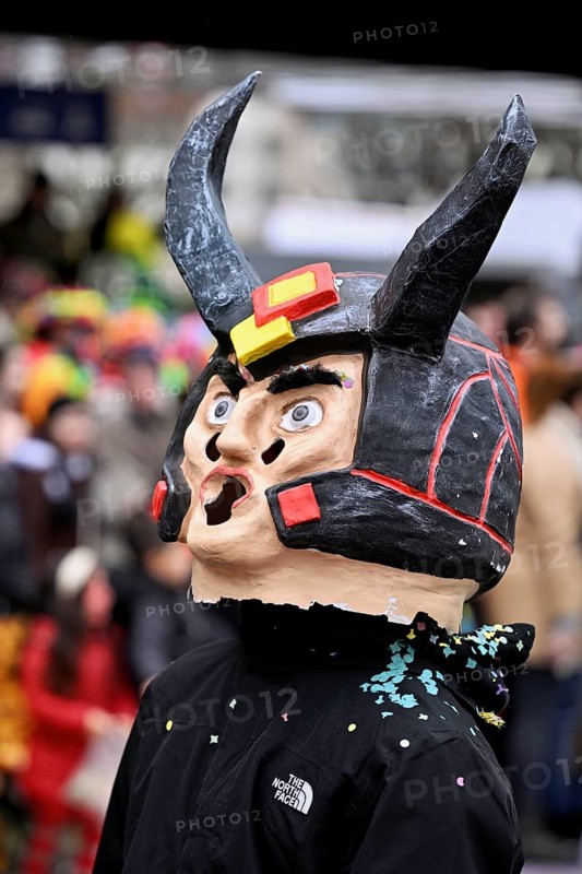 Person masked as a devil at the carnival parade of the Wey guild on Rose Monday, Güdismäntig, Lucerne Carnival 2024, Lucerne, Switzerland, Europe
