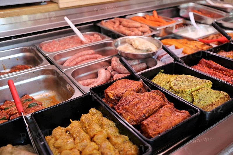 Variety of fine meat products in the butchery (Variety of fine meat products in the butchery)