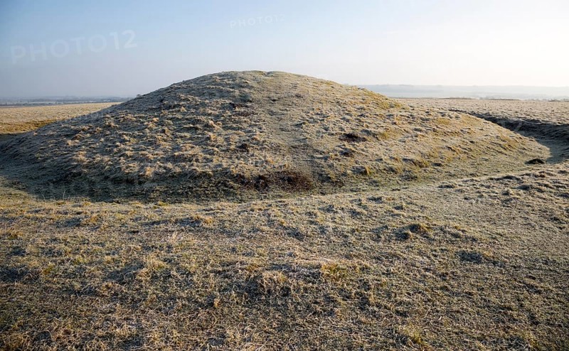 Bronze Age bowl barrow on Windmill Hill, a Neolithic causewayed enclosure, near Avebury, Wiltshire, England, UK