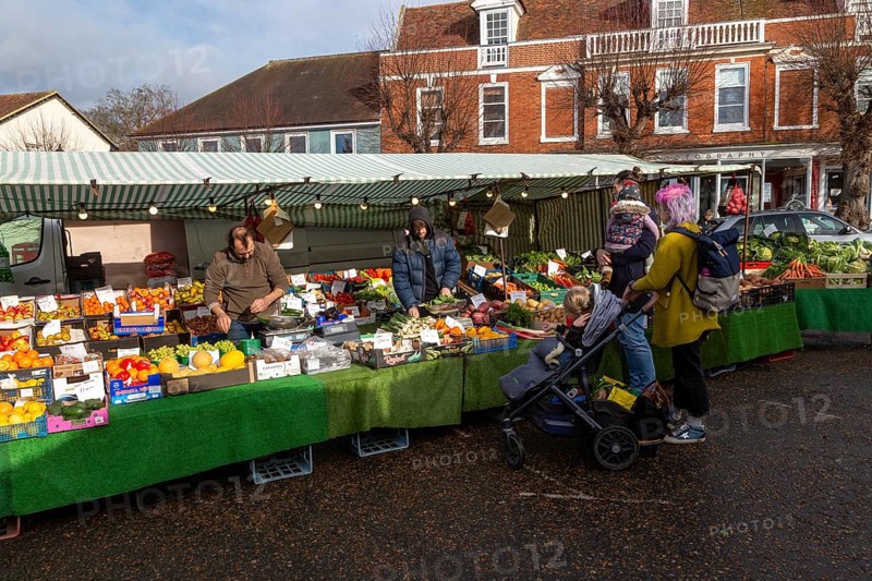 Market stall in town centre selling fruit and vegetables, greengrocer, Framlingham, Suffolk, England, UK