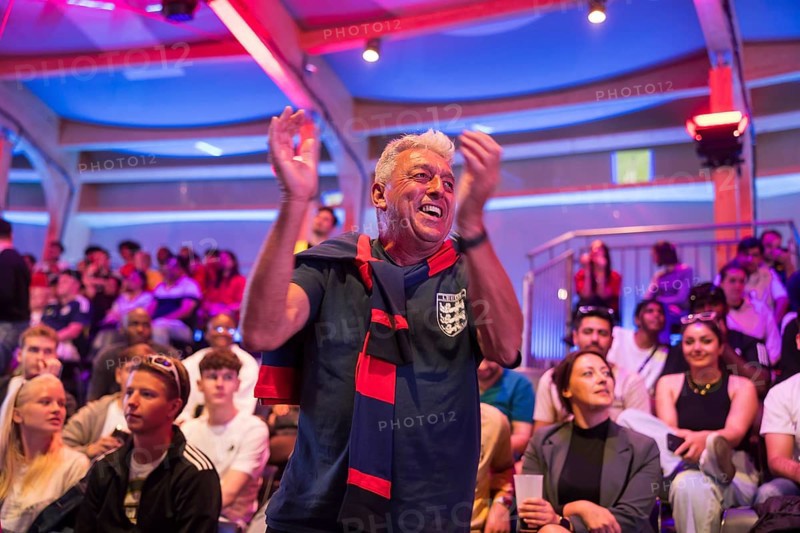 A fan of the British team celebrates the equaliser at the Adidas fan zone at the Bundestag during the final match between Spain and England at the European Football Championship, Berlin, 14.07.2024