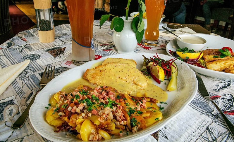 Wremer Panfisch with mustard sauce and bacon fried potatoes in the fish restaurant Wremer Fischerstube, Wremen, Wurster North Sea coast, Land Wursten, Cuxland, Lower Saxony, Germany, Europe