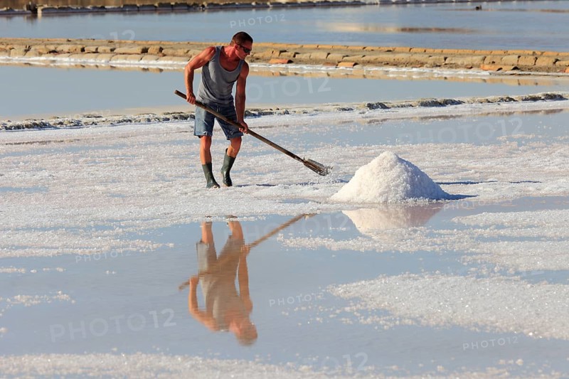 Workers in the salt pans of Trapani, Sicily, Italy, Europe
