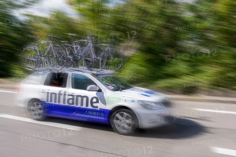Support vehicle at a cycle race with bicycles on the roof, fast movement emphasised by blurring, Stuttgart, Baden-Württemberg, Germany, Europe