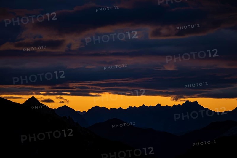 Montafon mountains with dramatic cloudy sky at sunrise, Tschagguns, Rätikon, Montafon, Vorarlberg, Austria, Europe