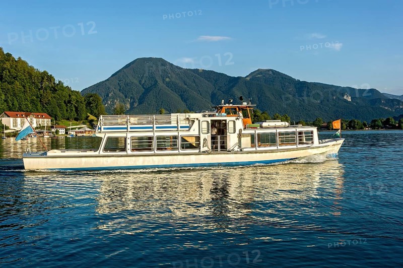 Passenger ship Kreuth on the Tegernsee, boat trip, warm evening light, mountains Wallberg and Setzberg in the Mangfall mountains, Roßsteinwand and Riedlerspitz, Tegernsee mountains, Bavarian Prealps, Upper Bavaria, Bavaria, Germany, Europe