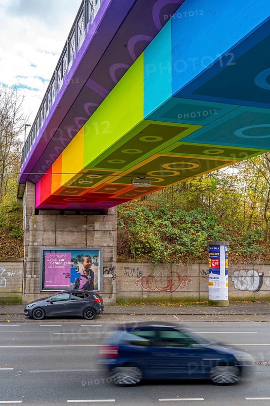 The Rainbow Bridge or Lego Bridge 2.0, over Dahler Straße, B7, undersides of bridges designed by artists, part of the Nordbahntrasse, a former railway line, now a cycle and footpath, Langerfeld district, Wuppertal, North Rhine-Westphalia, Germany, Europe