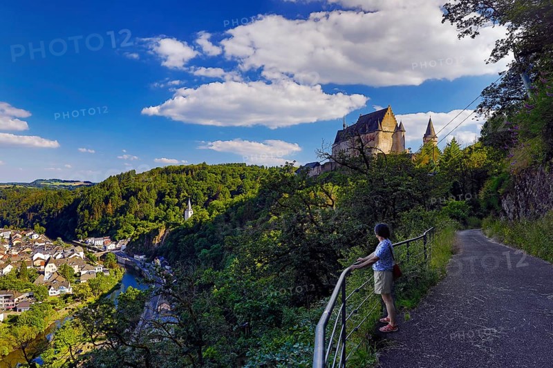 Elevated town view of Vianden with the river Our and the hilltop castle above the town, canton of Vianden, Grand Duchy of Luxembourg