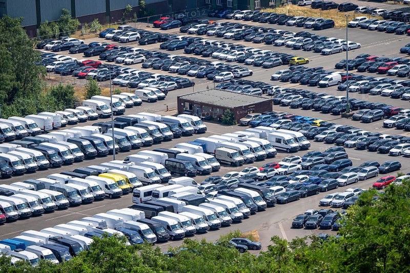 Site of the former Prosper Haniel colliery in Bottrop, currently used as a temporary storage facility for new vehicles, cars and vans, North Rhine-Westphalia, Germany, Europe