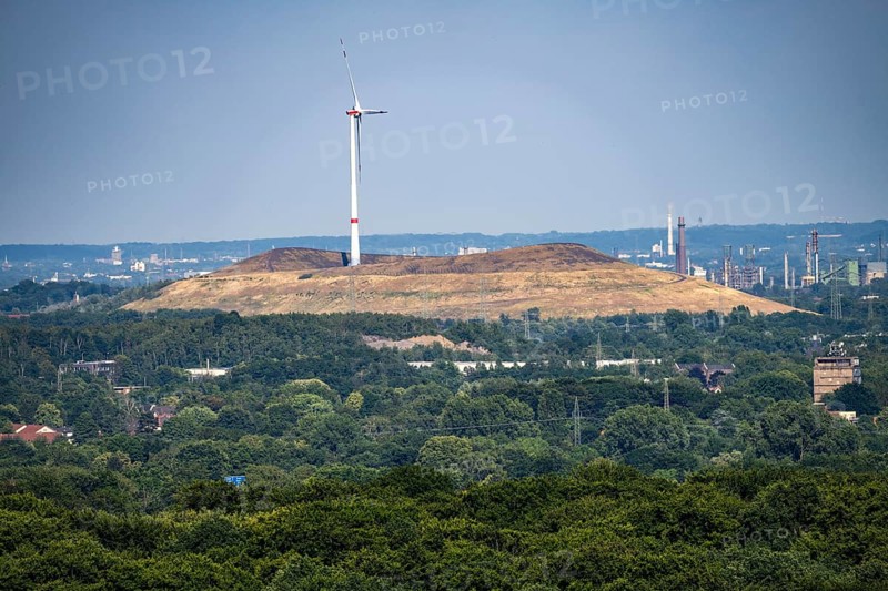 View of the Mottbruch spoil tip in Gladbeck, with wind turbine, from the Haniel spoil tip, lNorth Rhine-Westphalia, Germany, Europe