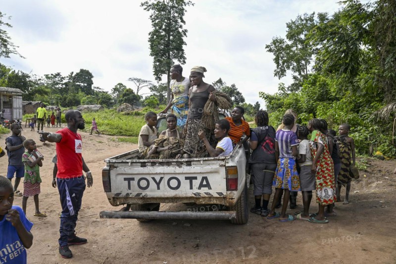 Pygmies of the Baka or BaAka people with their hunting nets on a pick-up truck, Bayanga, Sangha-Mbaéré Prefecture, Central African Republic, Africa