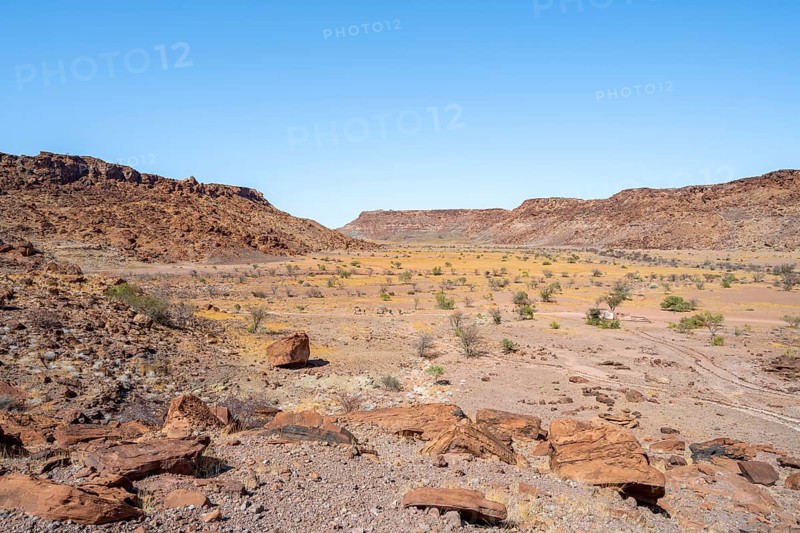 Barren landscape with boulders in a valley, desert landscape, Twyfelfontein, Kunene, Namibia, Africa