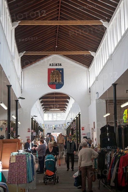 Shoppers inside the historic Shambles market hall in Devizes, Wiltshire, England, United Kingdom, Europe