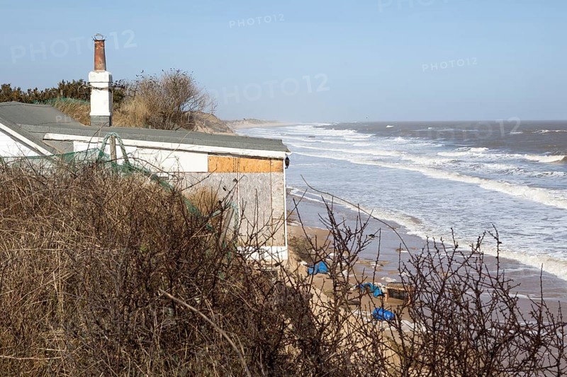 March 2018, Clifftop property collapsing due to coastal erosion after recent storm force winds, Hemsby, Norfolk, England, UK