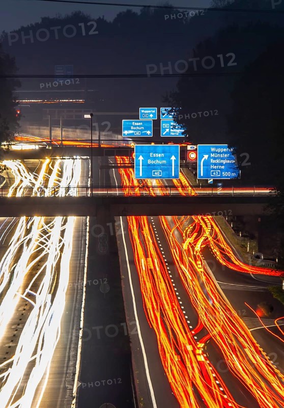 Motorway A40, Ruhrschnellweg, near Bochum, heavy evening traffic, in front of the motorway junction Bochum, A43, view in west direction