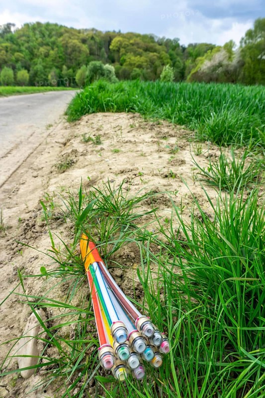Fibre optic cable, freshly laid along a dirt road, provision of high-speed Internet in rural areas, Mülheim an der Ruhr, North Rhine-Westphalia, Germany, Europe