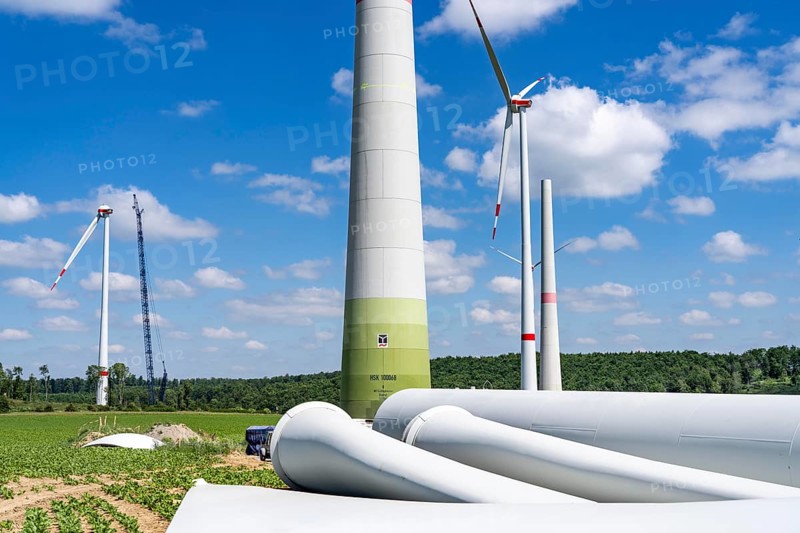 Repowering of a wind farm, near Brilon-Radlinghausen, 2 old turbines are demolished, rotors and dome are already on the ground and 4 new wind turbines are erected, each with a hub height of 160 metres, each with an output of 4.2 MW, North Rhine-Westphalia, Germany, Europe