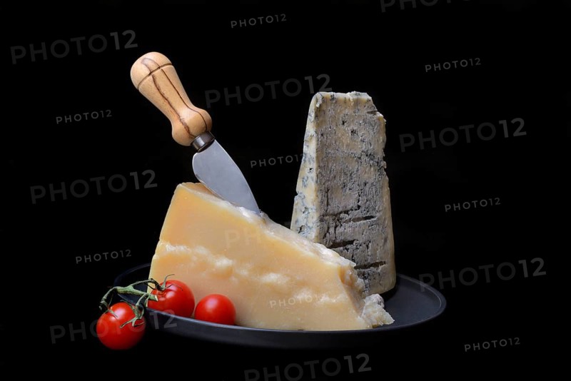 Parmesan cheese and gorgonzola cheese on a tray with cheese knife, Italy, Europe