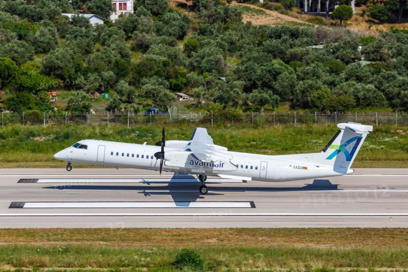 A De Havilland Dash 8 Q400 aircraft of Avanti Air with the registration D-AASH at Skiathos Airport, Greece, Europe