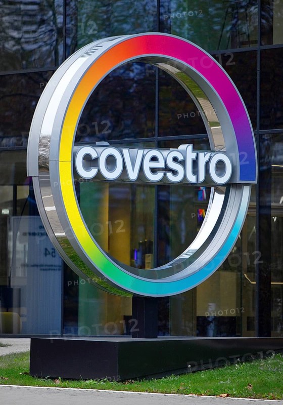 Covestro AG, company logo in front of the corporate headquarters at dusk, Leverkusen, Bergisches Land, North Rhine-Westphalia, Germany, Europe